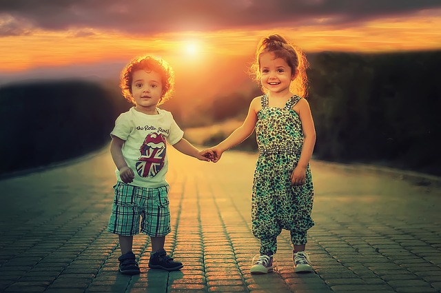 two children holding hands